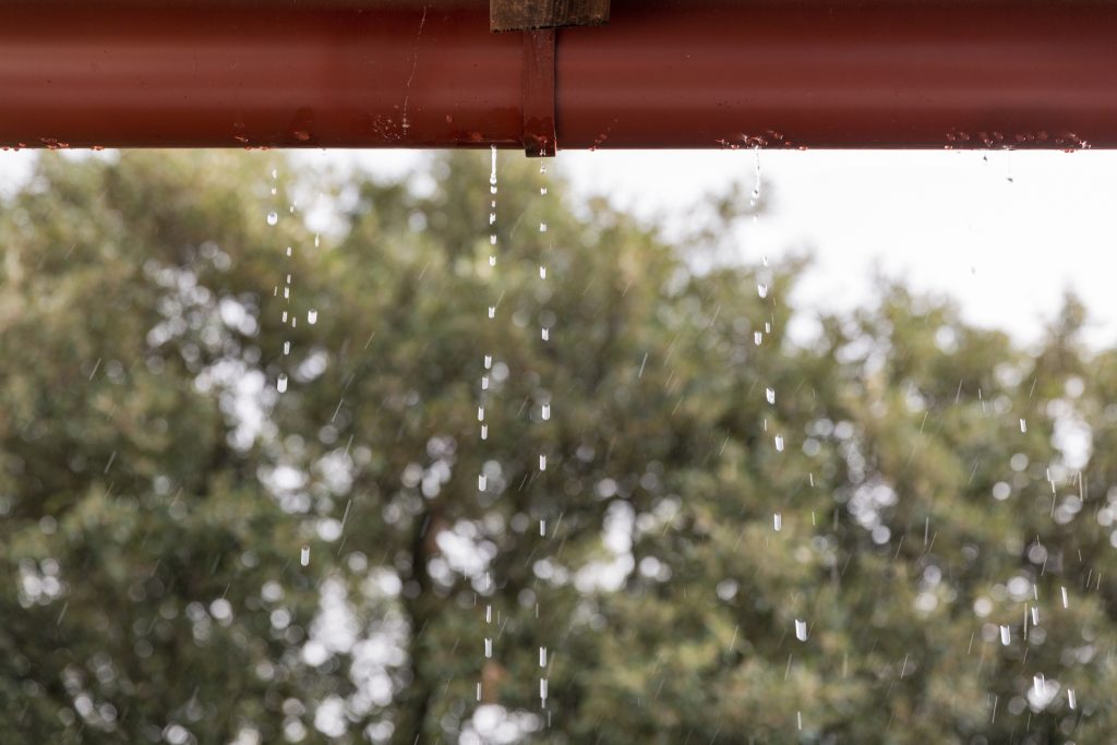 Umbrella Property Services cleaning gutters in North Vancouver homes